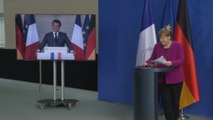 Macron y Merkel quieren acelerar la reconstrucción europea con medio billón