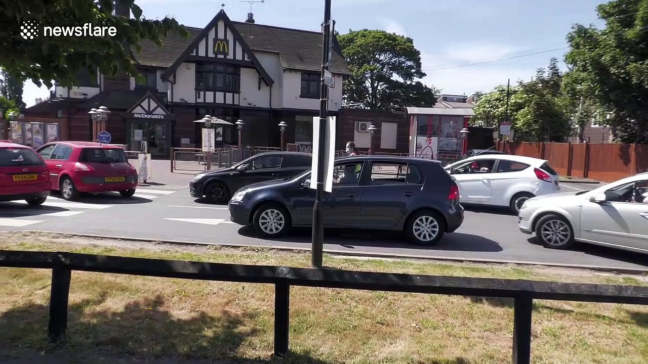 Long queues form 10 minutes after McDonald’s drive-thrus re-open in the UK