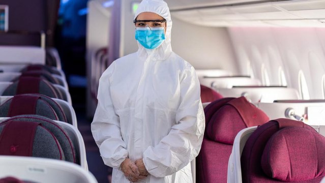 Qatar Airways' Flight Attendants Will Wear Full PPE Suits Starting Monday