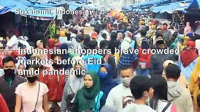 Indonesia shoppers shrug of virus concerns, hit markets before Eid