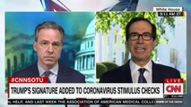 Mnuchin shows Trump debit card like those for coronavirus relief payments _ TheHill