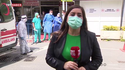 Sağlık çalışanları tulum içinde sıcakla da mücadele ediyor