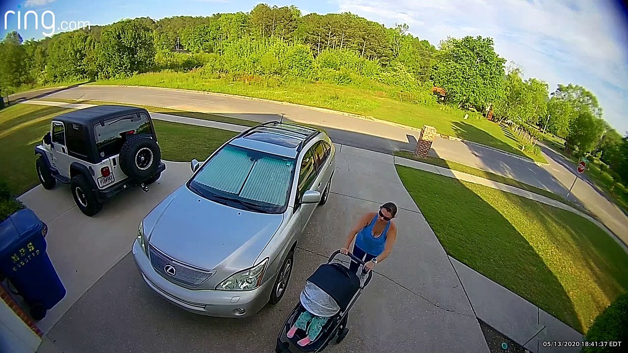 Stroller Rolls Away From Tired Mom