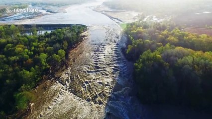 Drone footage shows extensive damage from failed Michigan dam