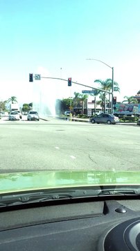 Busted Fire Hydrant Sprays Sky High at Intersection