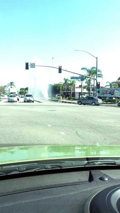 Busted Fire Hydrant Sprays Sky High at Intersection