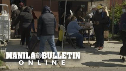 Volunteers distribute food in New York as unemployment worsens in US