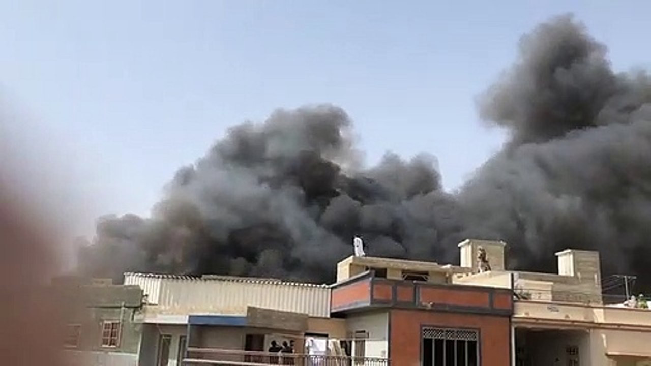 Dark Clouds of smoke after PIA Plane Crashed in Karachi