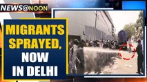 Migrants sprayed with disinfectant in South Delhi, authority says 'mistake' | Oneindia News
