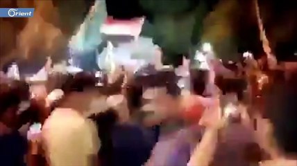 العراقيون يسقطون صور خامنئي وسليماني