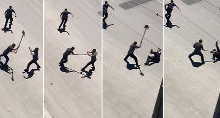 Polisin başına kürekle vurdu