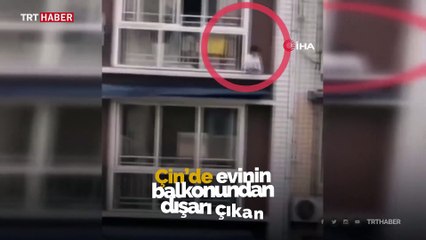 Çin'de balkona çıkan çocuk ölümden döndü