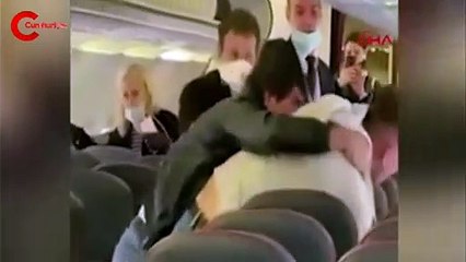 Yolcu uçağında yumruk yumruğa 'sosyal mesafe' kavgası