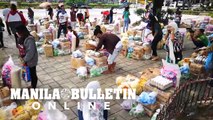 400 displaced vendors from Cebu City were given relief goods by DOLE at Plaza Independencia