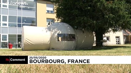 Coronavirus: French nursing home's special tent lets elderly have visitors again