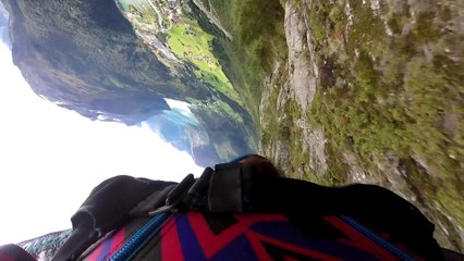 Wingsuit Base Jumper Collects Some Branches on His Run
