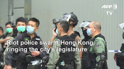 Hong Kong riot police beef up security ahead of flashpoint anthem debate