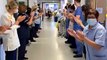 Nurse Becky Usher is applauded as she leaves Pinderfields Hospital
