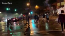 Minneapolis police fire flash grenades at protest over George Floyd's death