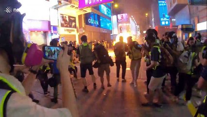 Defiant protesters in Hong Kong demand independence amid burning rubbish