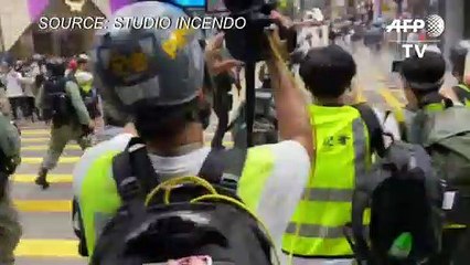 Pepper-ball rounds fired in Hong Kong to stamp out national anthem protests