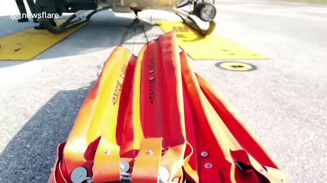 Thai army helicopters used to extinguish grass fire