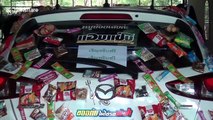 Thai couple attach snacks to car for locals to get during COVID-19 pandemic