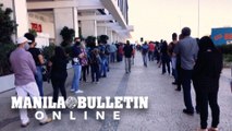 Customers queue as shopping malls reopen in Brasilia despite pandemic