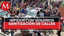 Pobladores impiden labores de desinfección contra covid-19 en calles de Oaxaca