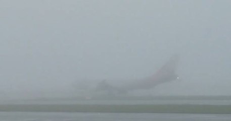 Airplane swallowed by fog before takeoff