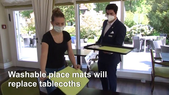 Paper napkins, drive-through stand: virus forces makeover for swanky German hotel