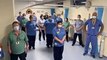 NHS workers clap for the public-