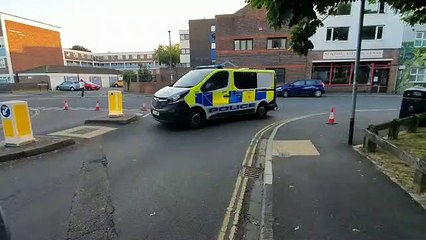 Police tape off flat block in Southsea