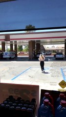 Gallons of Gas Spilling on the Ground
