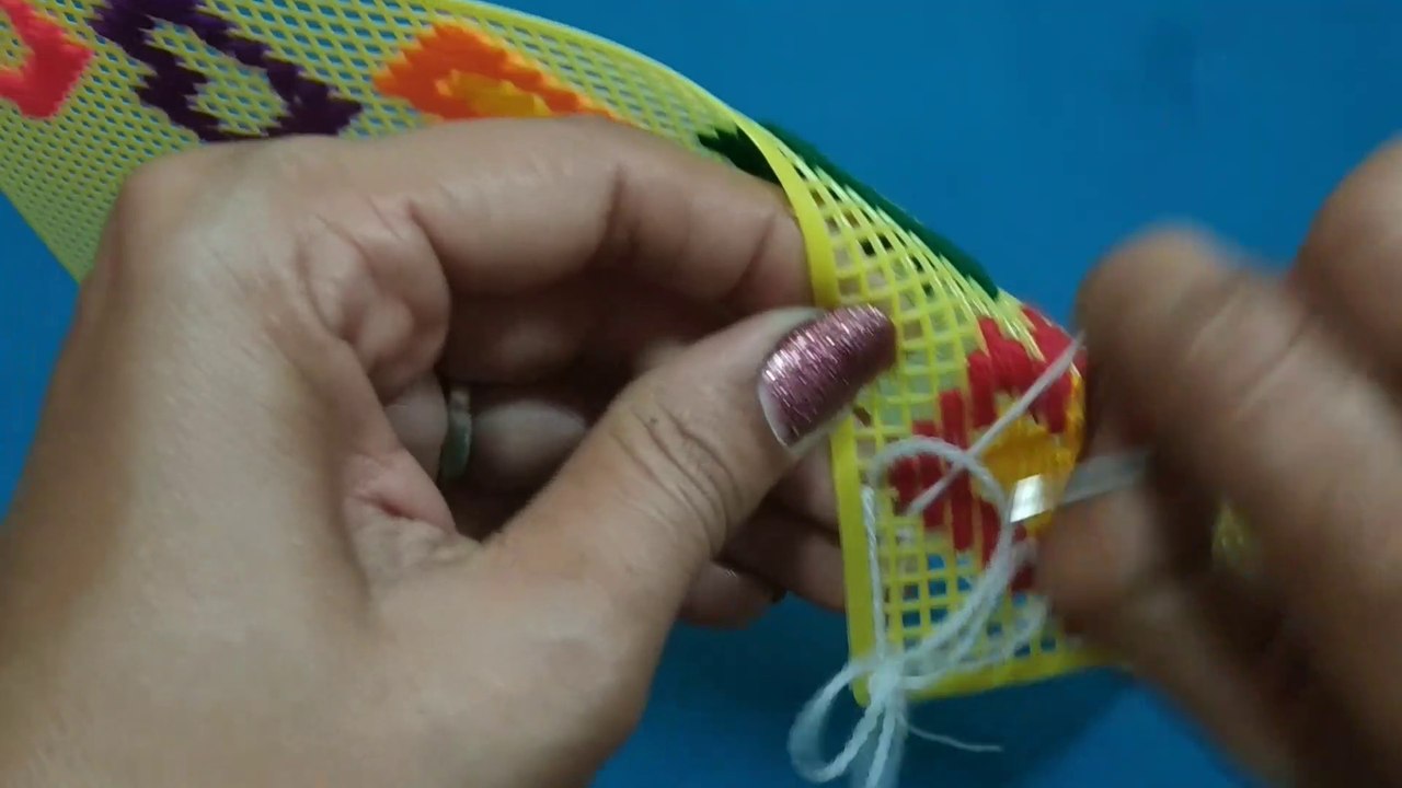 Hand made fan, use of woollan Plastic Canvas Design with woollan, Hand made craft design, Home Decoration products make by hand, sjawati products, Sazawati Saman,