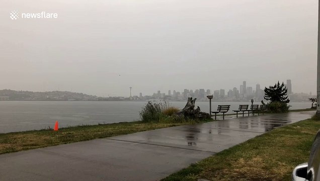 Amazing footage as two lightning bolts strike Seattle simultaneously across Puget Sound