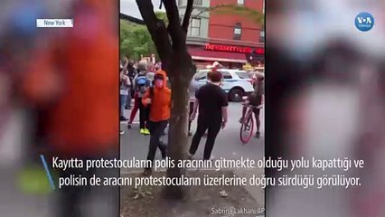 New York'ta Polis Aracını Göstericilerin Üzerine Sürdü
