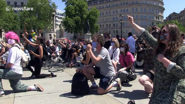 Black Lives Matter protesters kneel in Trafalgar Square in honour of George Floyd