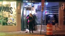 Moment Miami sneaker store looters flee in panic after 'man in passing car' fires shots