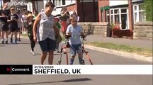 Nine-year-old British boy with cerebral palsy completes marathon charity walk