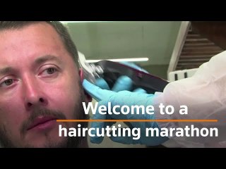 Barber gives over 90 haircuts in 48-hour marathon