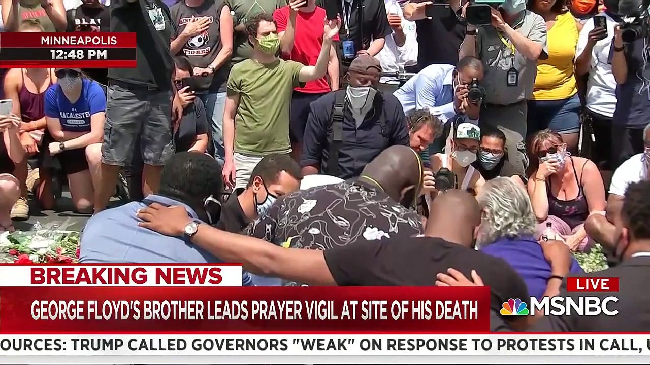 George Floyd's brother leads protest crowd in prayer at the site of his brother's death