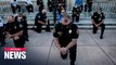 Police kneel in New York; take part in George Floyd protest which spread to over 140 cities