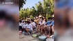 University students in China use bowls of water to learn how to swim during coronavirus pandemic