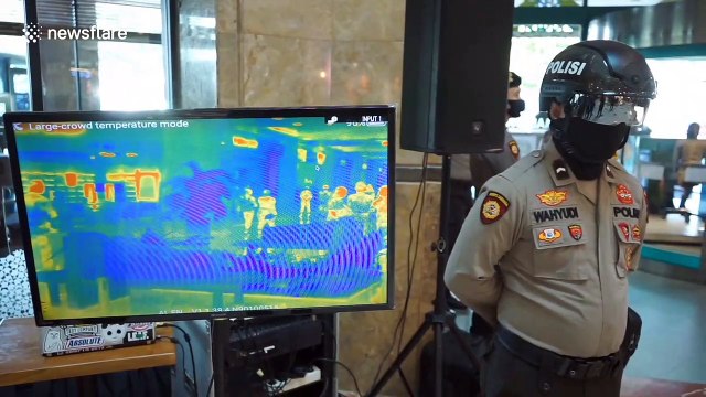 Indonesian police are using 'thermal scanning helmets' to detect COVID-19