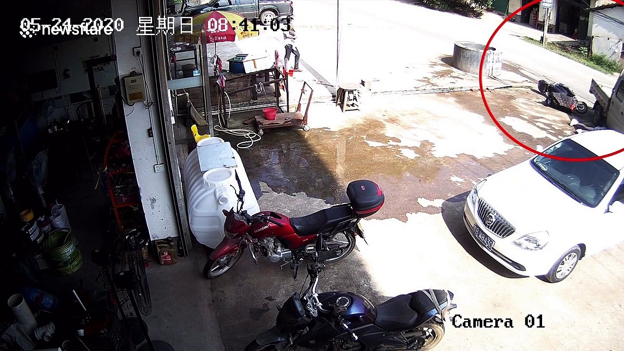 Helmet saves Chinese biker's life after truck runs over her head