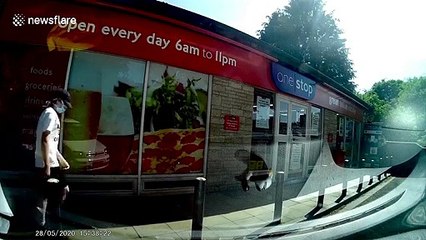 Dashcam captures moment three men steal from shop in western England