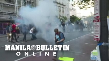 Tear gas is fired at peaceful protesters to clear way for Trump photo op