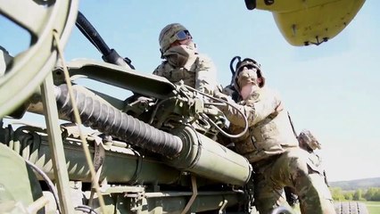 US Army - Heavy-Lift Helicopter - CH-47 Chinook Carrying Heavy Artillery Howitzer