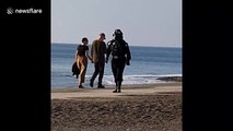 Guy strolls around Aberystwyth seafront as 'Star Wars' tie fighter pilot